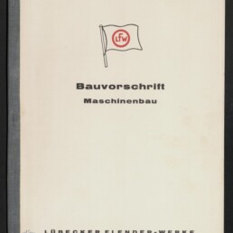 Cover eines technischen Handbuchs mit einer kleinen Flagge mit rotem „LFW“-Logo über der Überschrift „Bauvorschrift Maschinenbau“ und dem Firmennamen „Lübecker Flender‑Werke“ am unteren Rand; weißer Umschlag mit schwarzem Buchrücken.