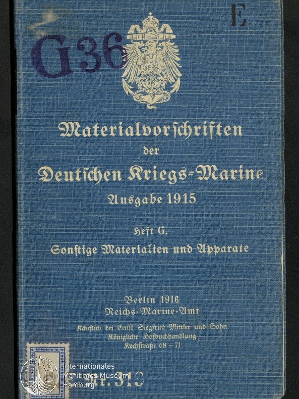 Blauer Leineneinband eines Hefts mit goldfarbenem Reichsadler oben und Frakturschrift-Titel 