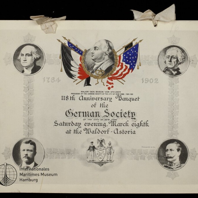 Einladung zur 118. Jubiläumsbankett der German Society New York, mit zentralem Porträt, US- und deutschen Fahnen und vier Medaillonporträts.